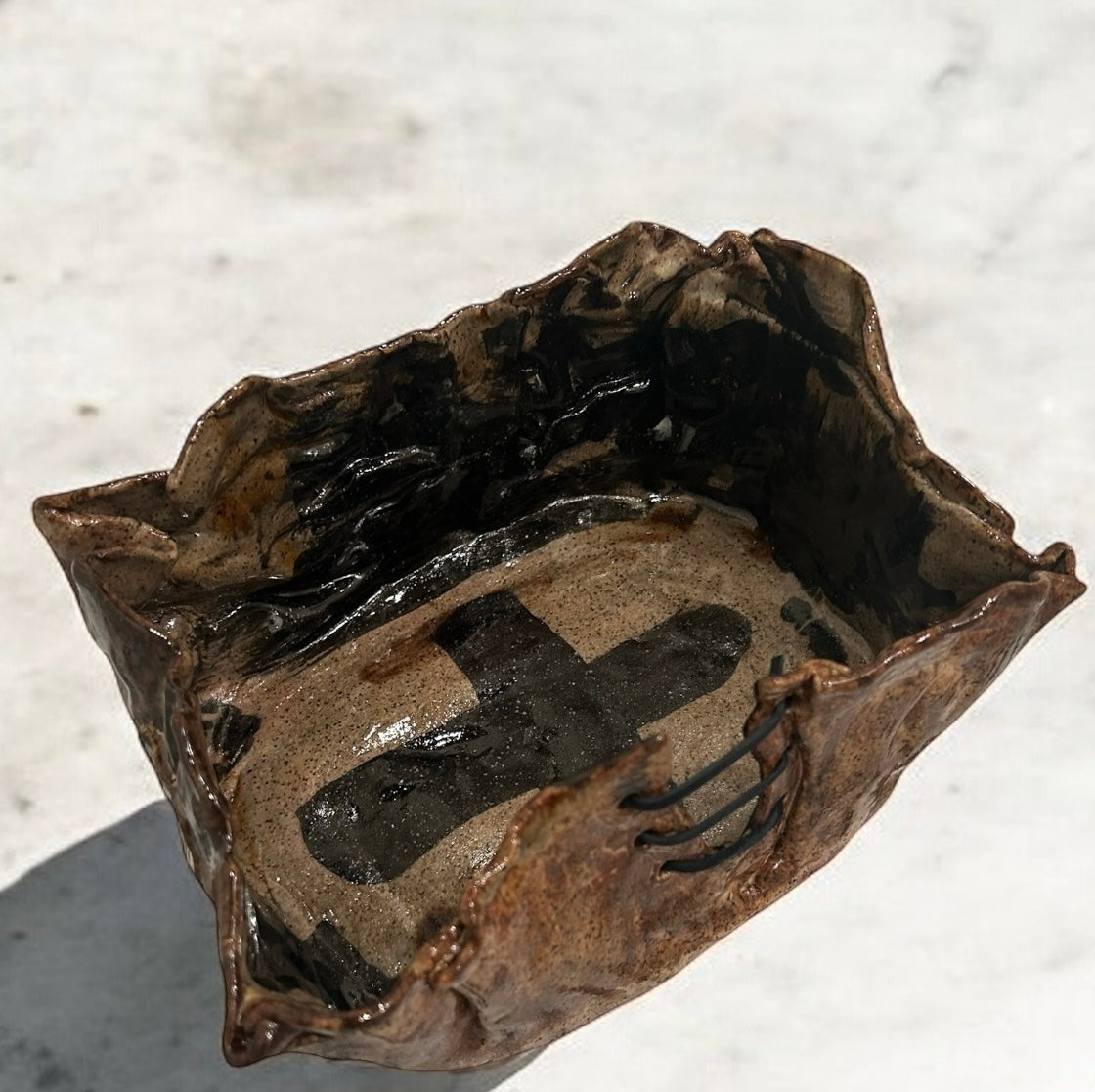 CERAMIC WITH LEATHER